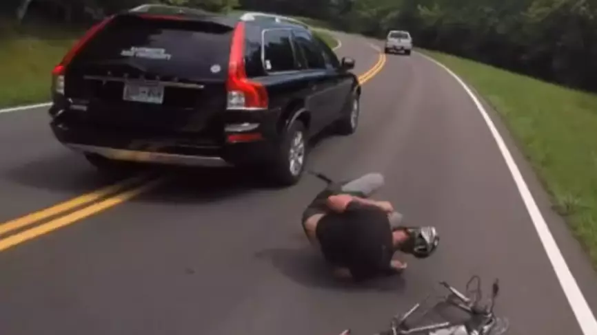 Volvo Driver Brutally Knocks Cyclist Off His Bike Before Racing Away