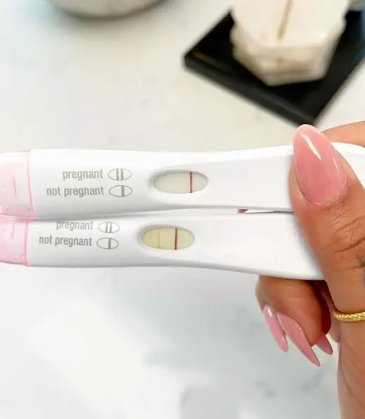 The star shared a picture of two pregnancy tests - and a lengthy caption (