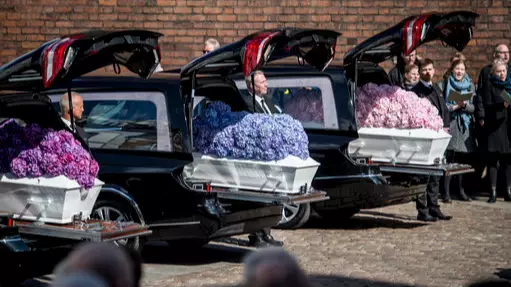 Heartbreaking Photo Shows ASOS Tycoon's Three Children Being Laid To Rest 