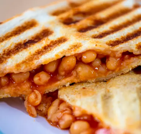 A jaffle is commonly filled with tinned beans or spaghetti