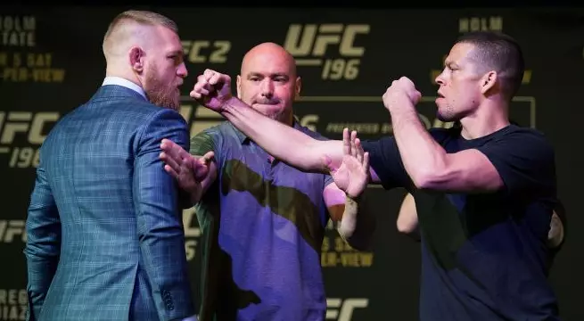 WATCH: Conor McGregor Punches Nate Diaz On The Hand In Fiery Press Conference