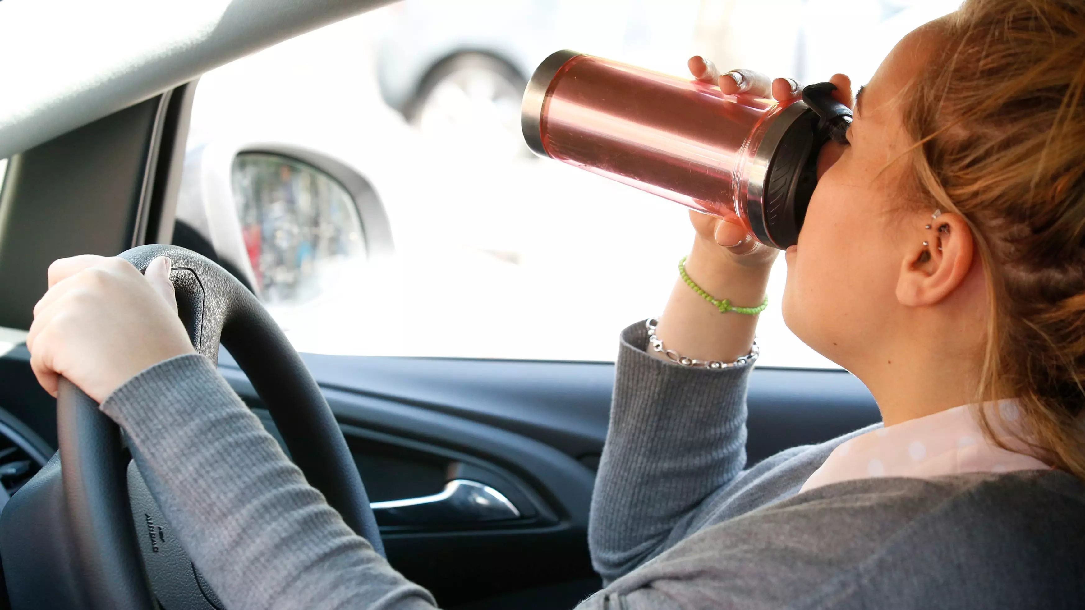 Aussie Woman Threatened With $500 Fine And Three Points For Drinking Coffee While Driving