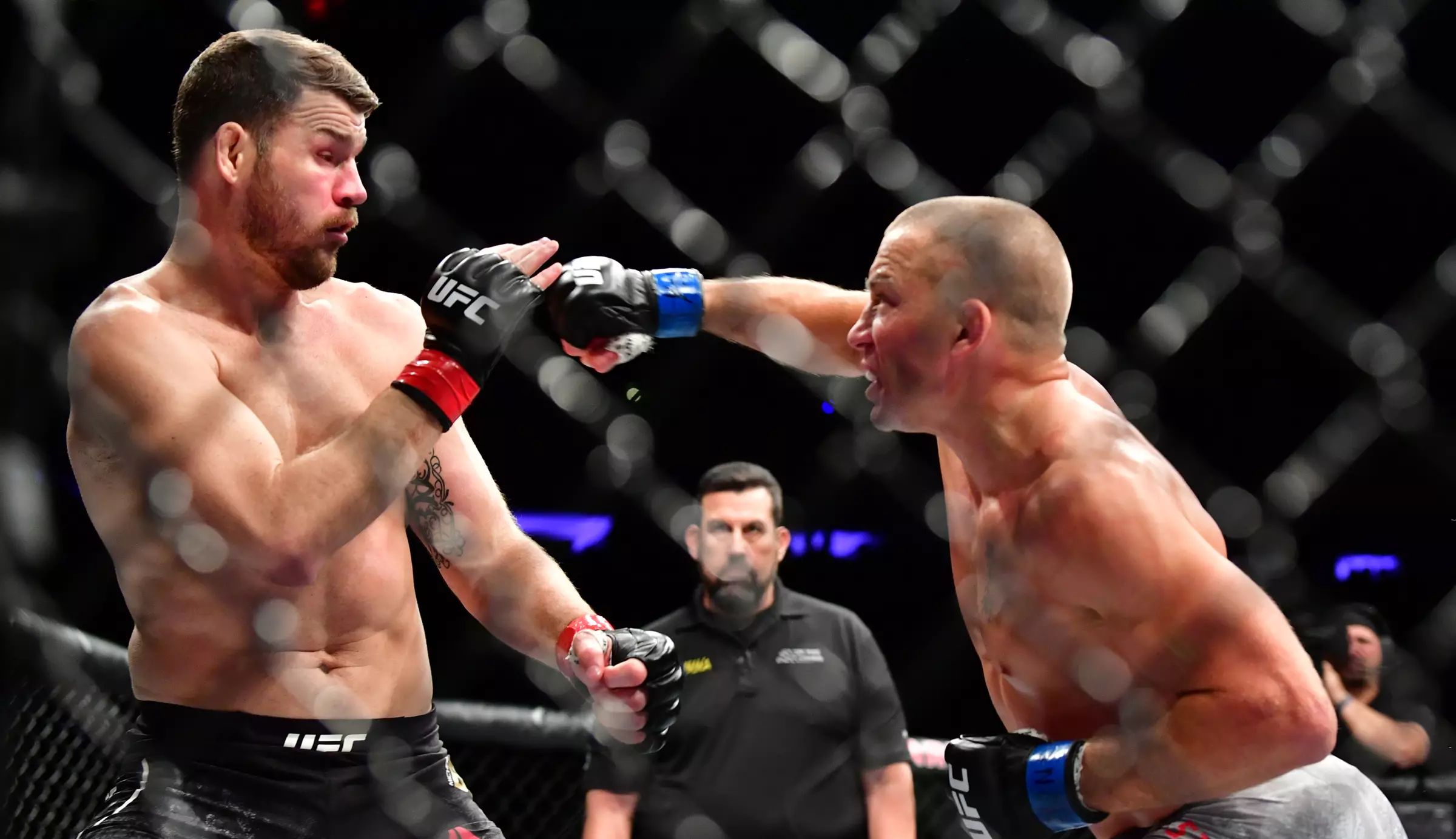 Michael Bisping (in red) up against George St-Pierre in 2017.