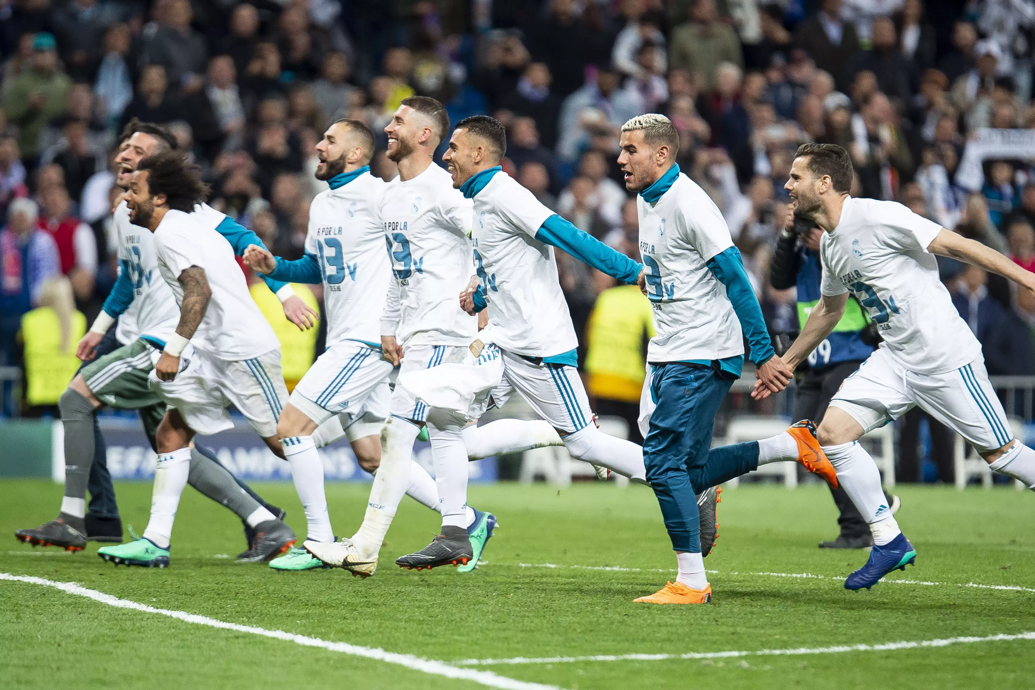 Real Madrid team celebrate advancing to the final. Image: PA