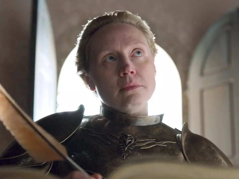 Brienne writing in the White Book.