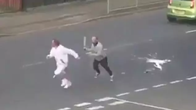 Machete-Waving Thug Chases Man Down Glasgow Street In Broad Daylight