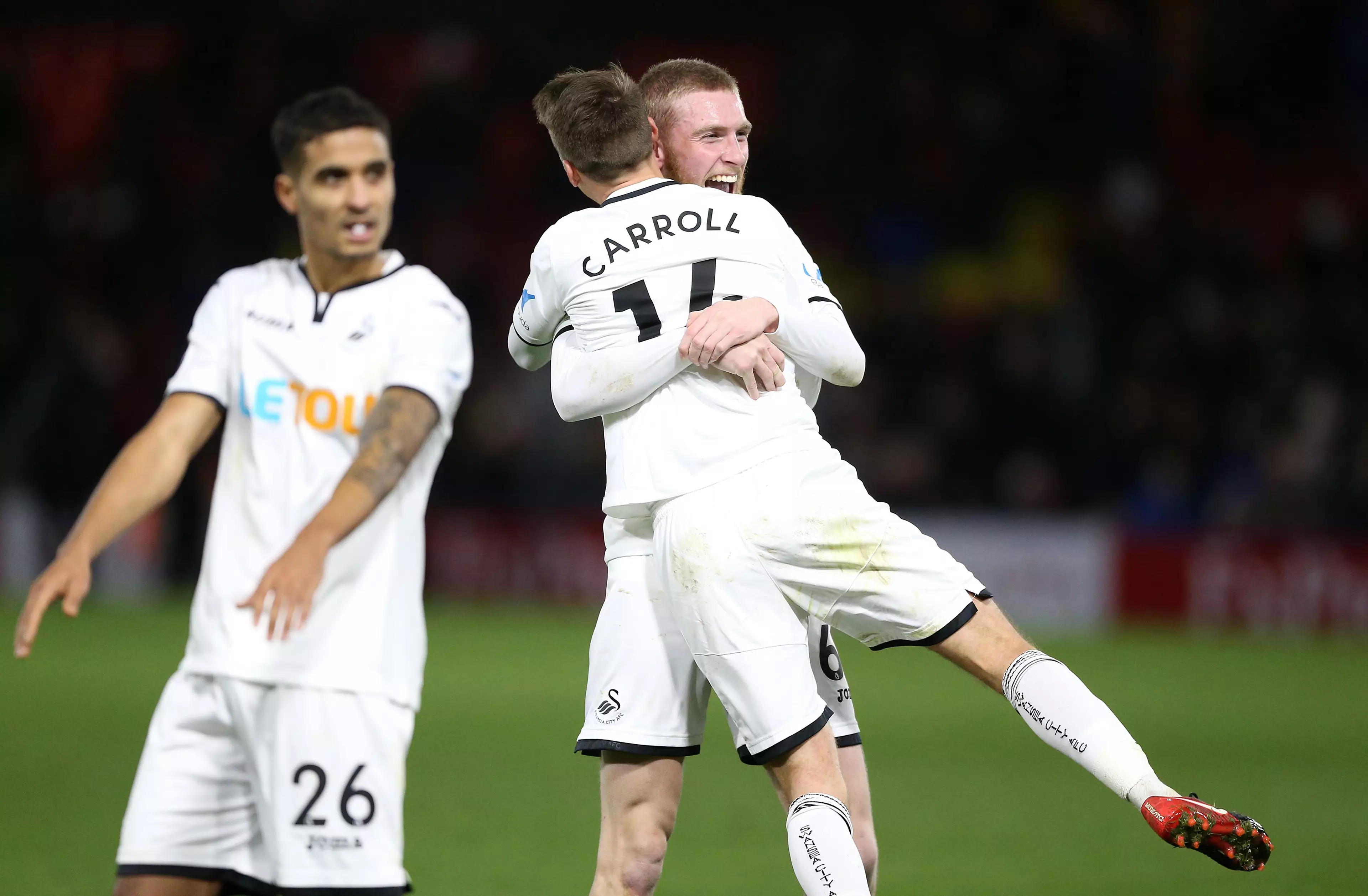 Swansea celebrate a rare win over Watford. Image: PA Images.