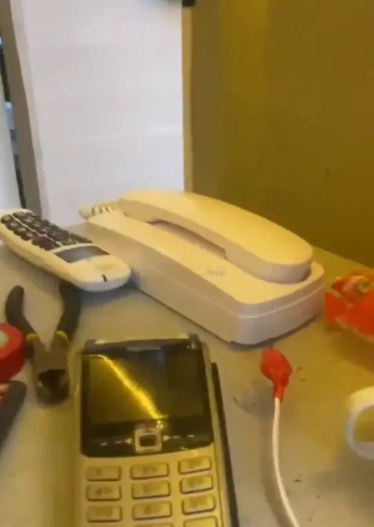 The phone behind the bar.