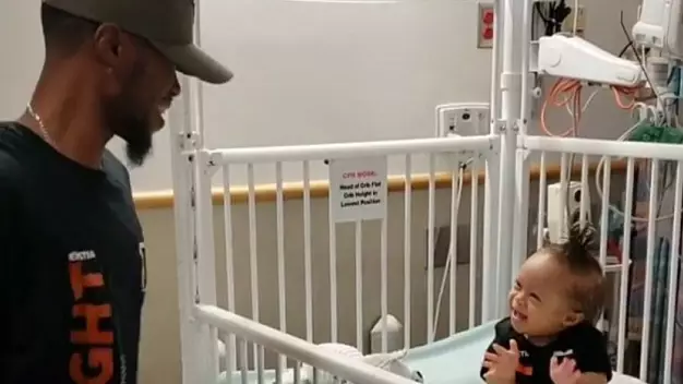 Dad Joyously Dances Next To Son's Hospital Bed To Celebrate Release After Chemotherapy