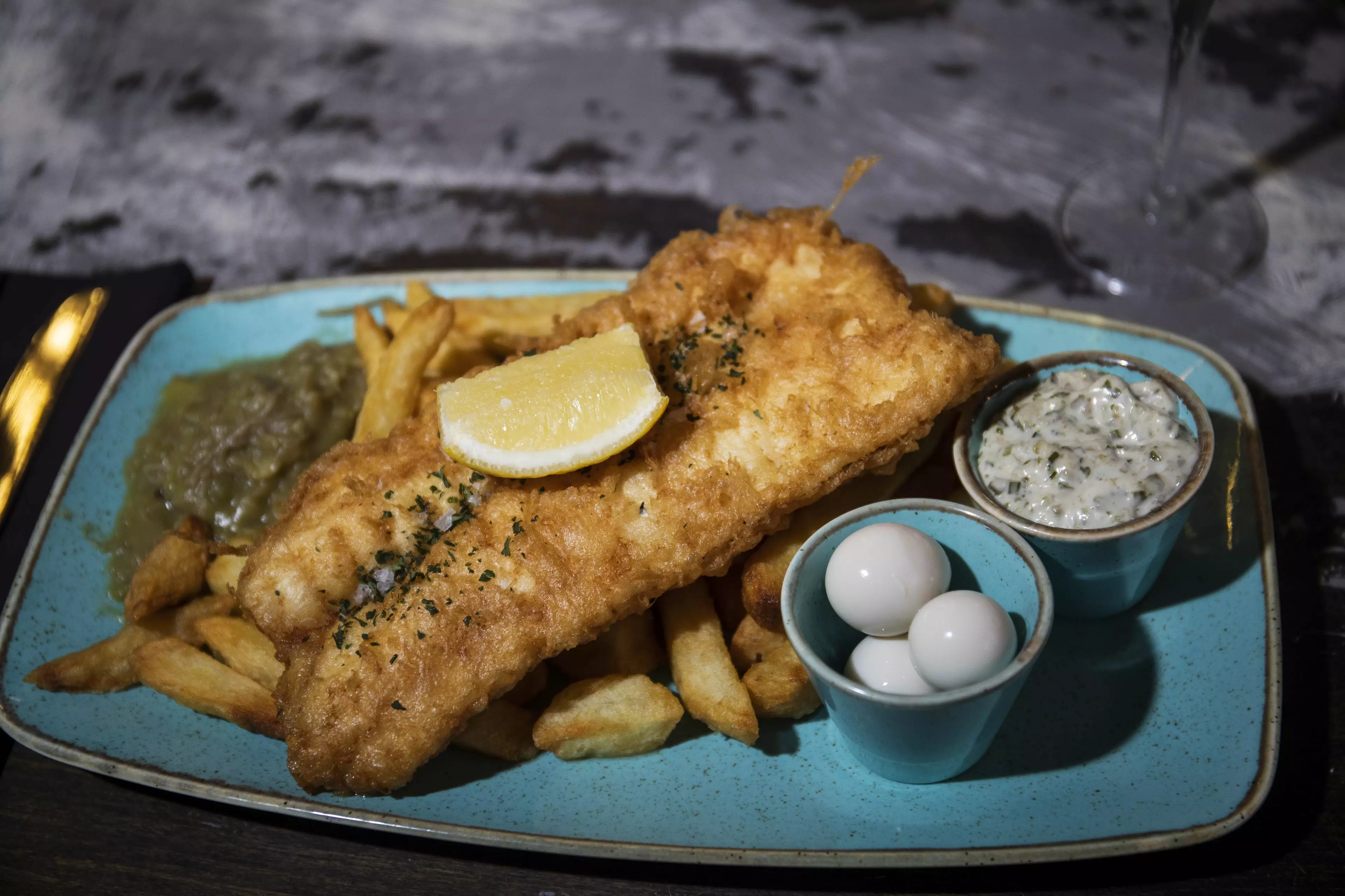 Fish and chips with a side of quail eggs preserved in champagne, anyone? (