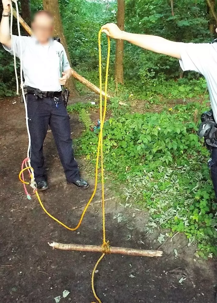 German police examine the rope swing.