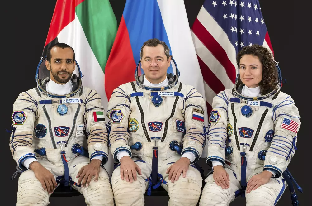Jessica Meir (right) with fellow astronauts Hazza Ali Almansoori and Oleg Skripochka.