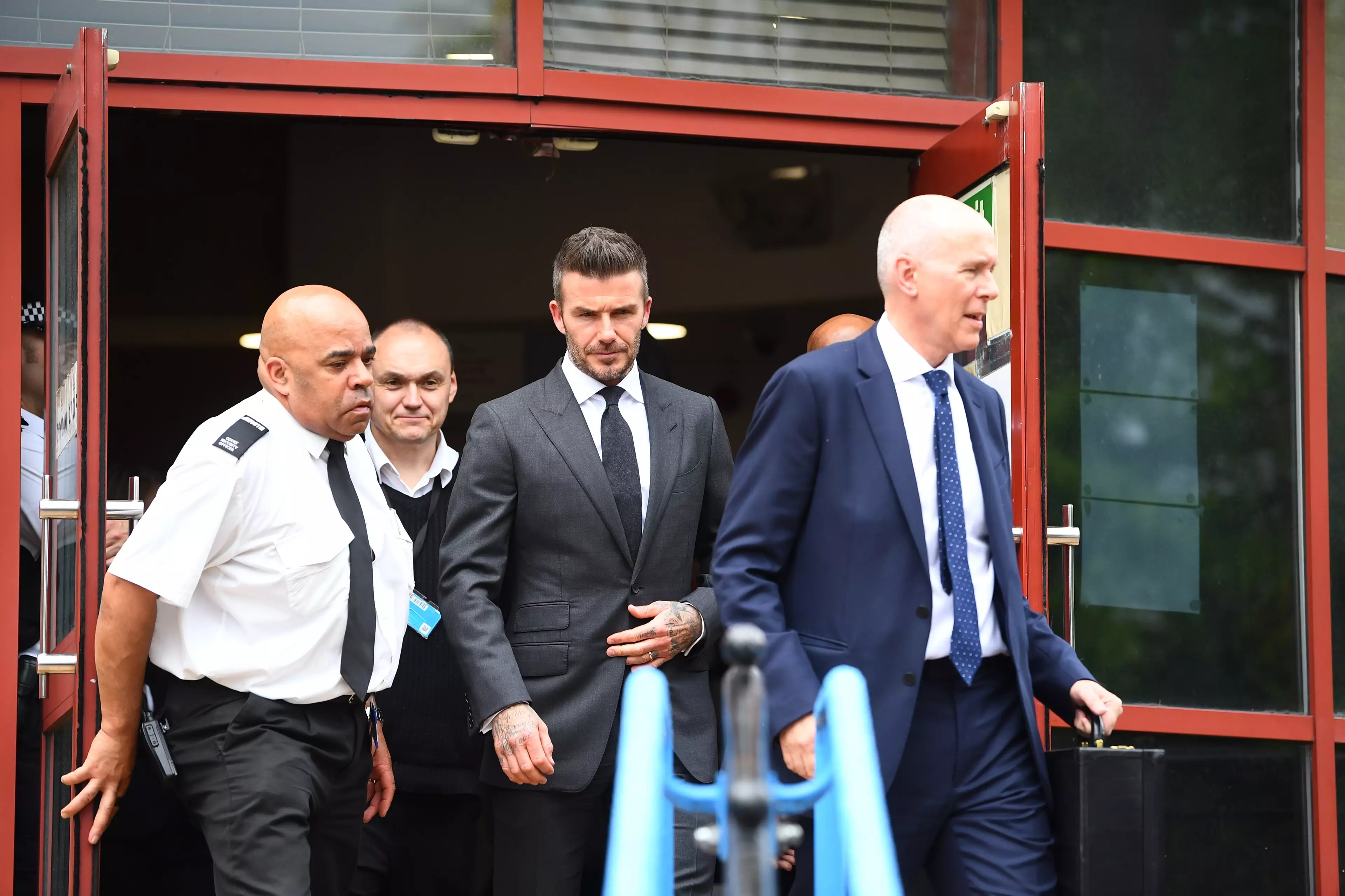 Beckham leaving court.
