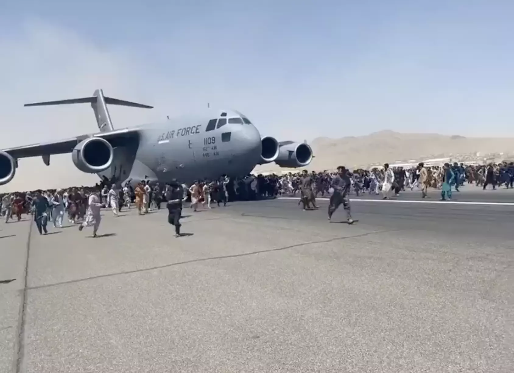 People were seen clinging to a US air force cargo plane in an attempt to flee Afghanistan.