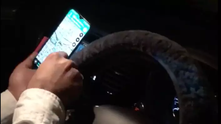 Driver Caught With Phone Strapped To Steering Wheel To Watch The Cricket