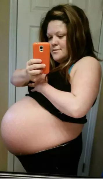 Melissa pregnant with twins.