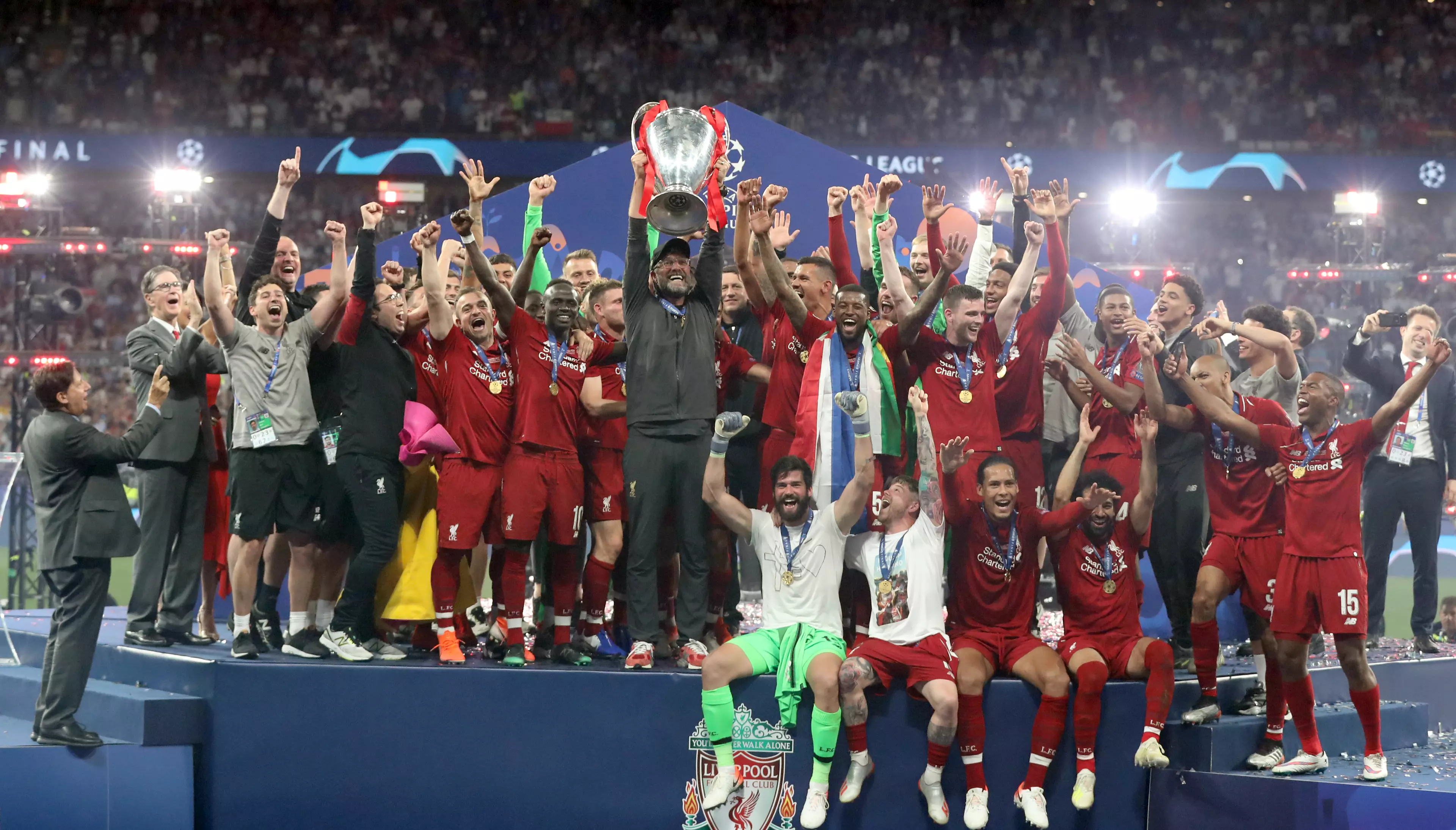 Liverpool manager Jurgen Klopp lifts the UEFA Champions League Trophy.
