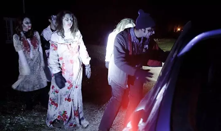 Visitors drive to different scare points with live actors popping up along the way (