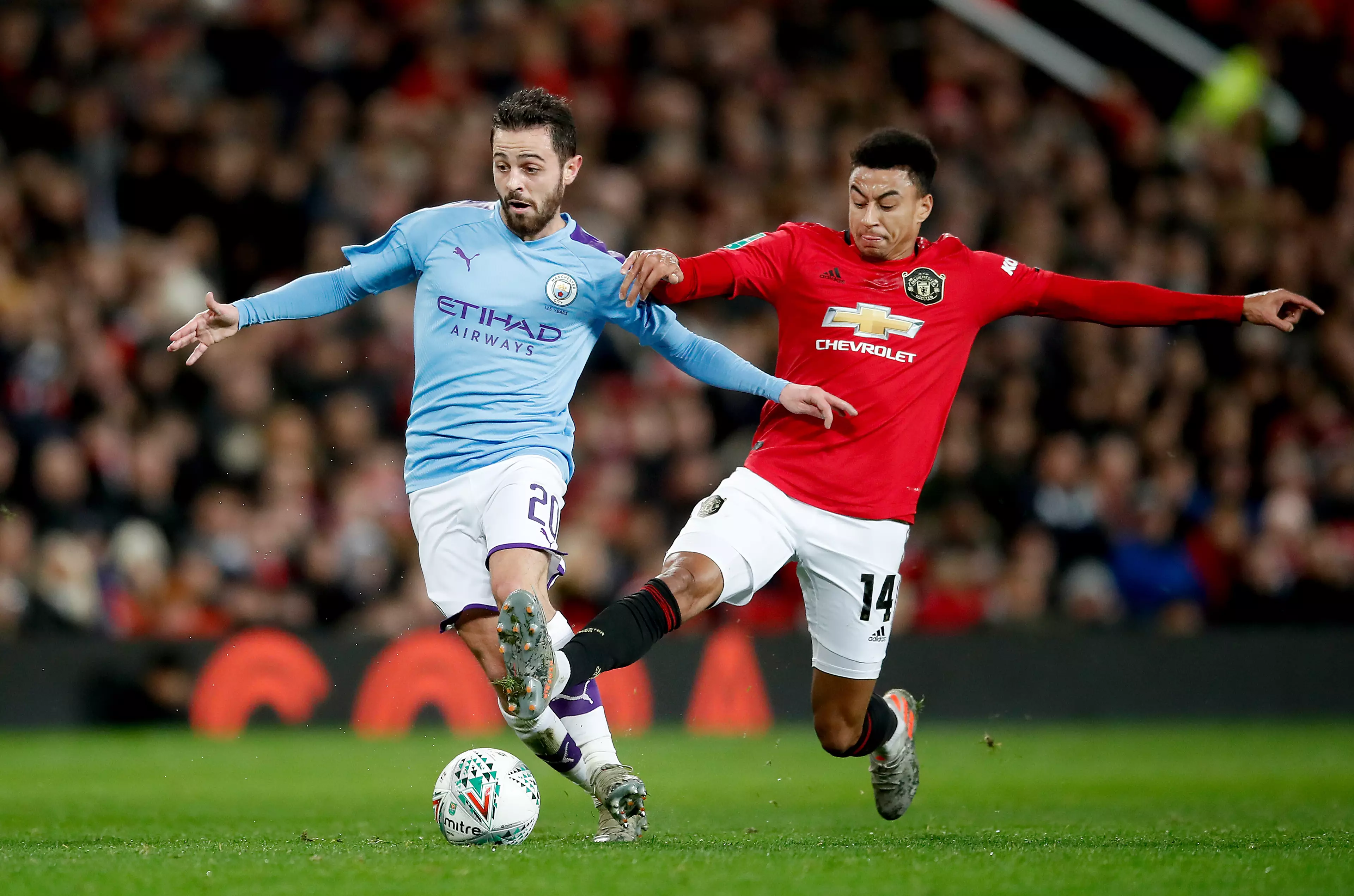 Lingard vs Silva during the game. Image: PA Images