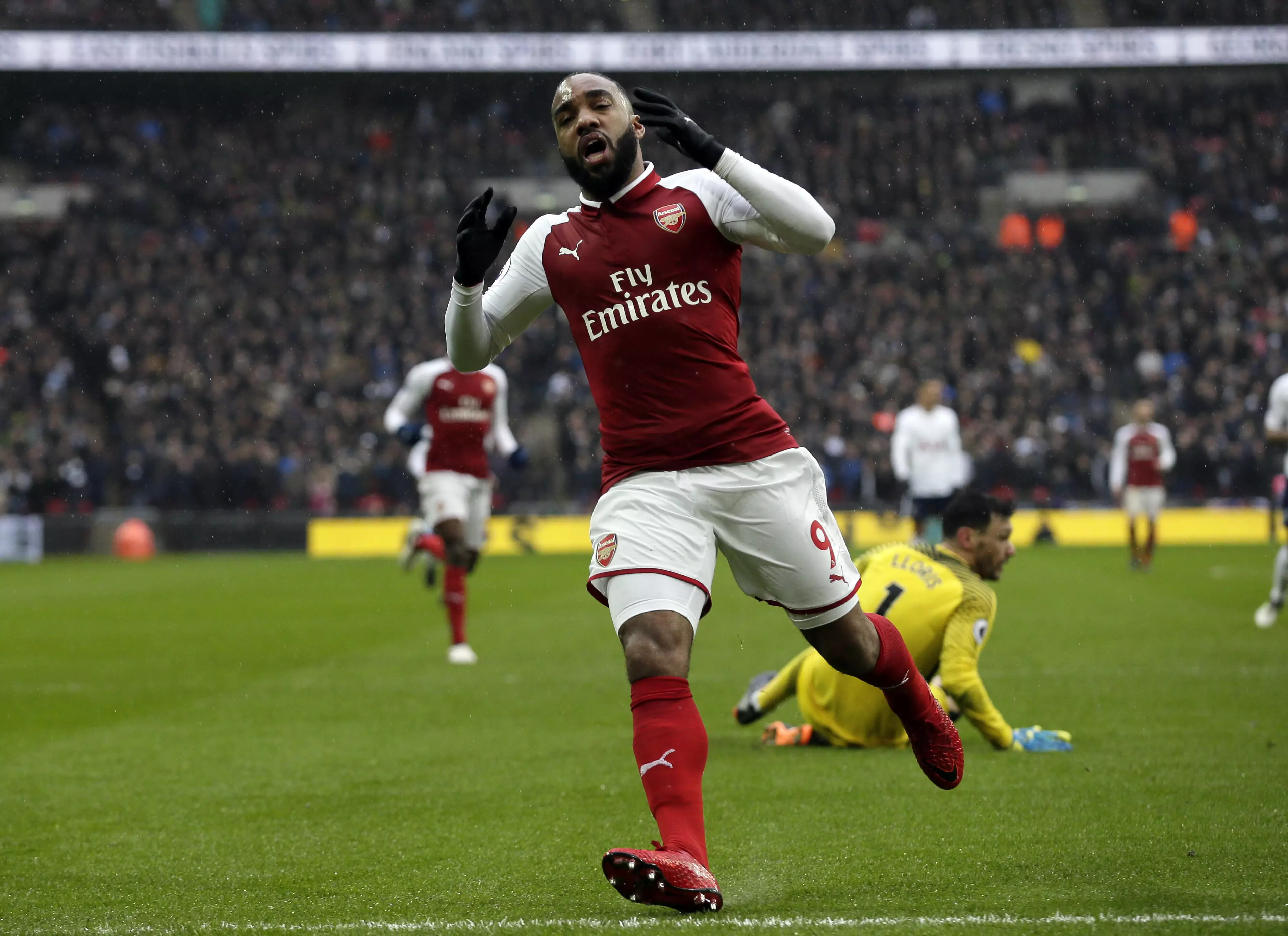 Lacazette reacts to missing his chance. Image: PA