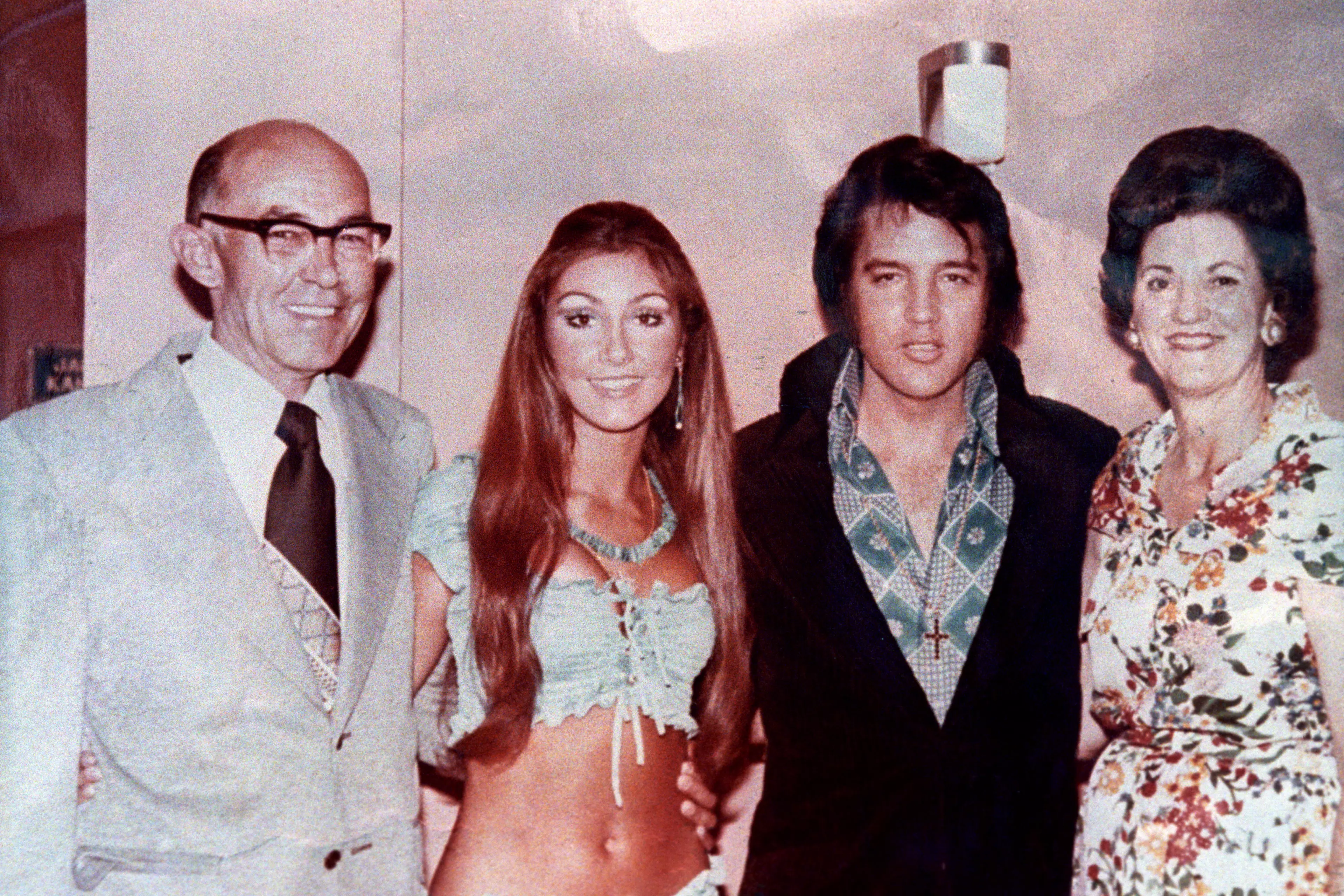 Elvis with Linda Thompson and her parents.