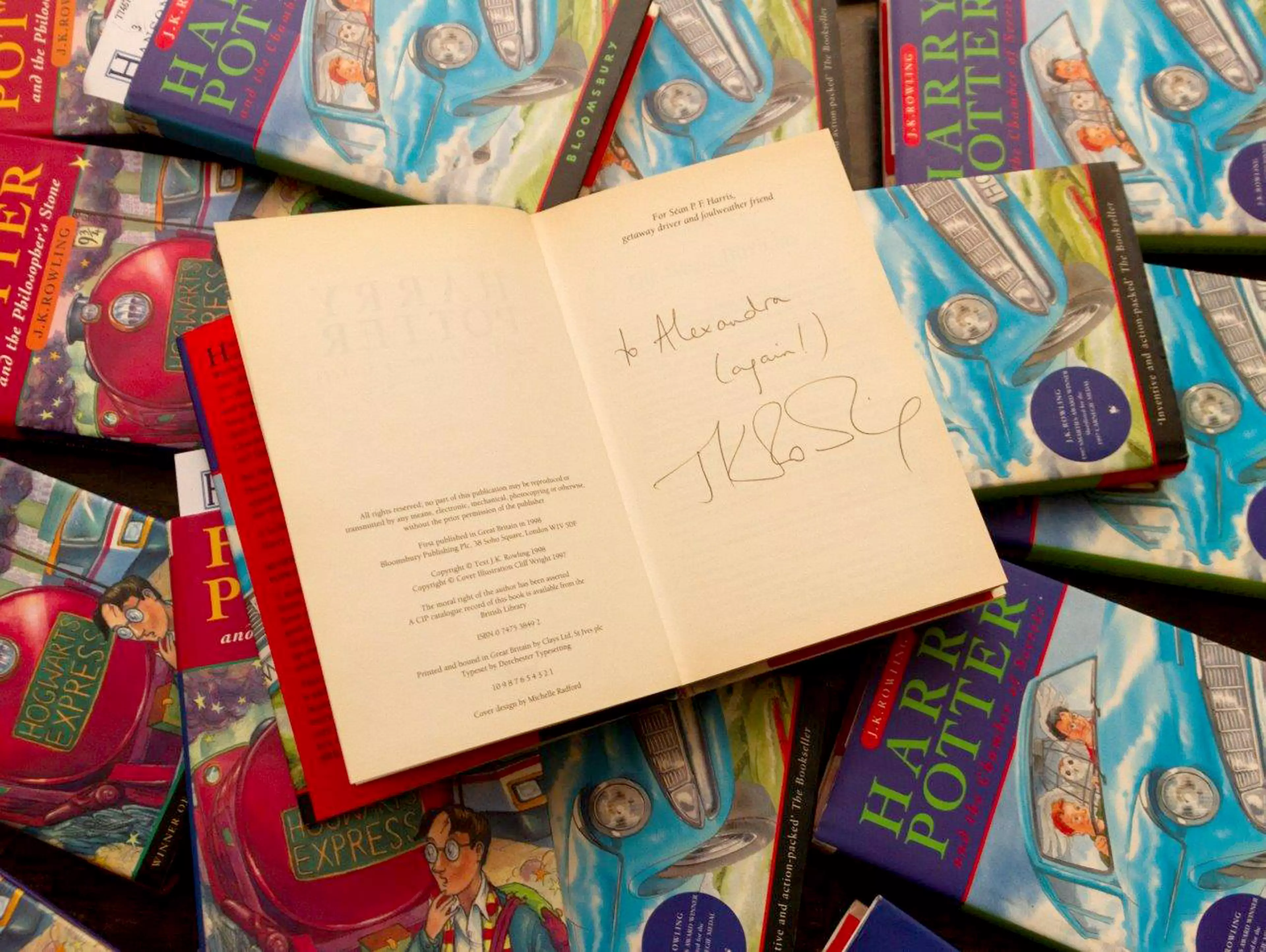 The Harry Potter book was signed by J.K. Rowling (