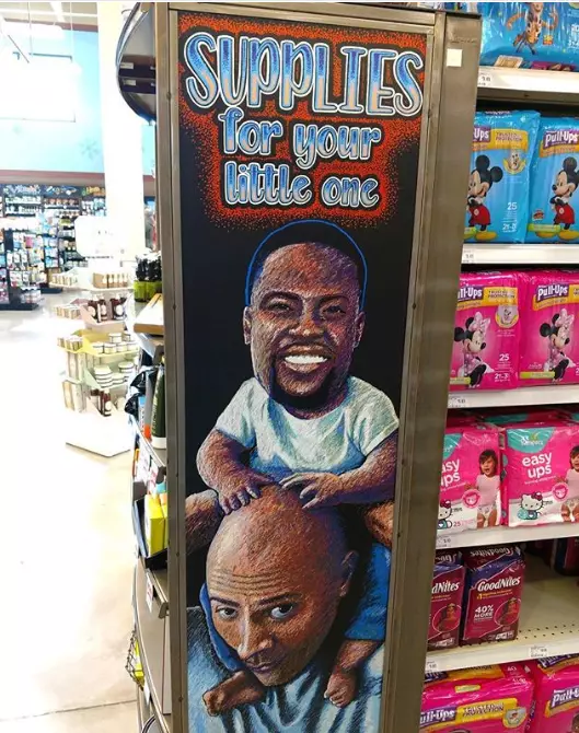 The Rock and Kevin Hart have appeared on this weird advertising display.
