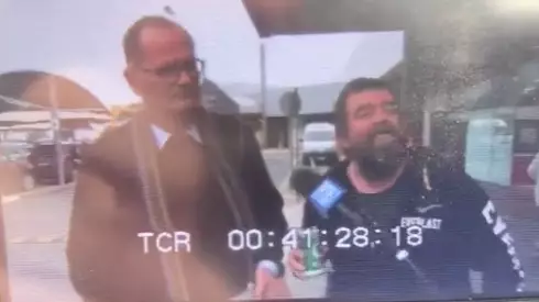 Man Carrying VB Interrupts TV Interview To Give His Two Cents On NSW-VIC Border Closure