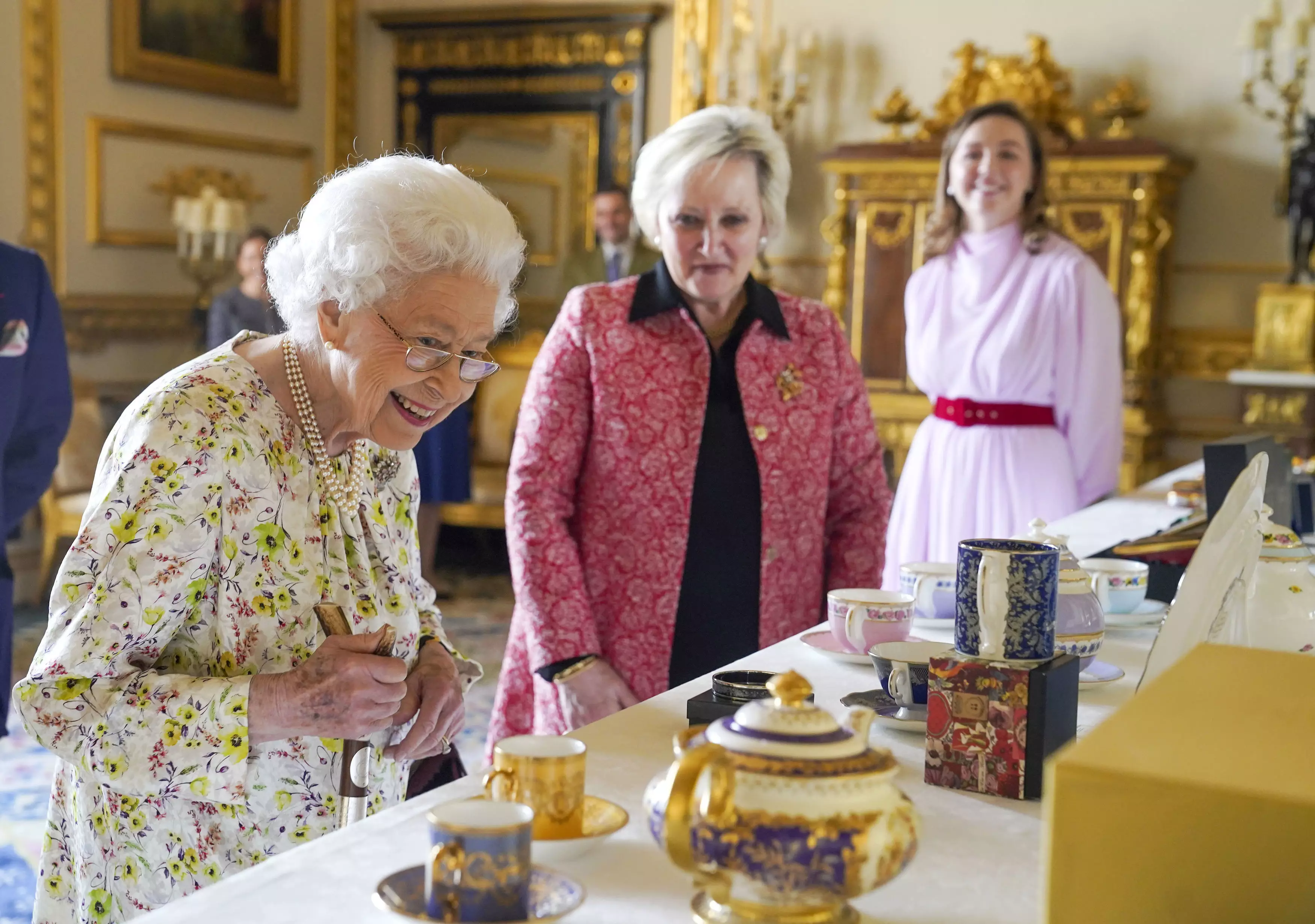 People are loving the Queen's reaction to a collection of hand painted teapots (