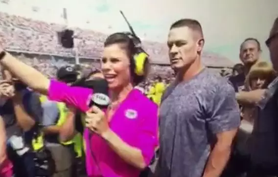 WATCH: NASCAR Reporter Literally Can't See John Cena And He Can't Believe It