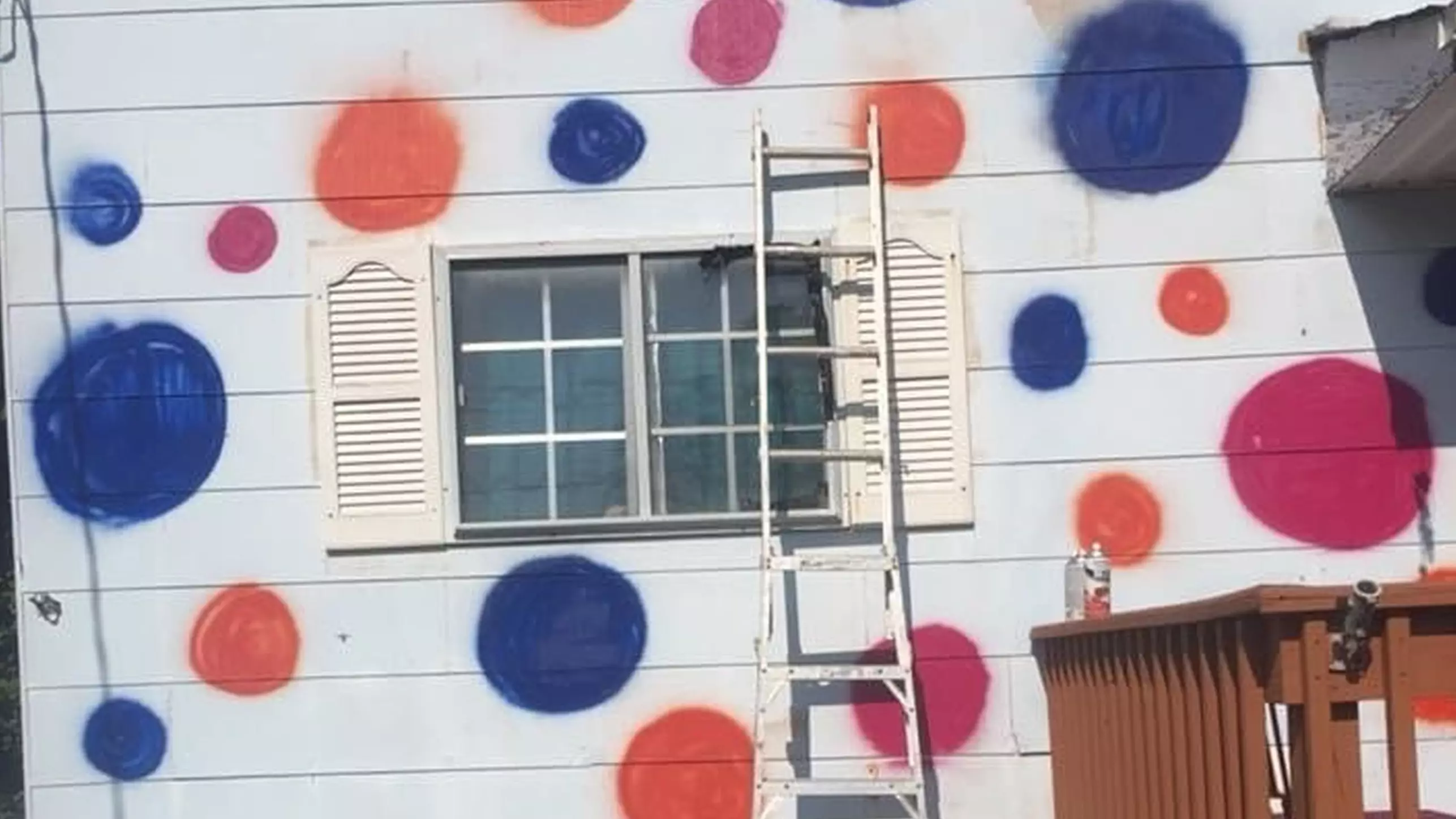 Woman Hilariously Paints ‘Ugly’ Polka Dots On House To Annoy 'Miserable' Neighbours