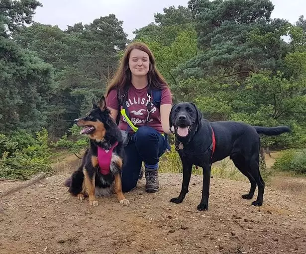 Megan Taylor with Ruby and Rowley who are Disability Assistance Dogs.