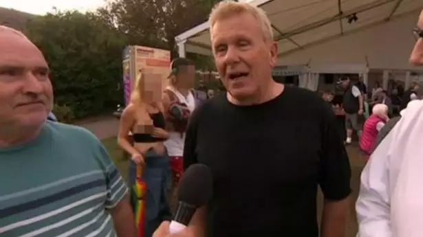 Woman Flashes Breast During Live BBC Interview At Folk Festival 