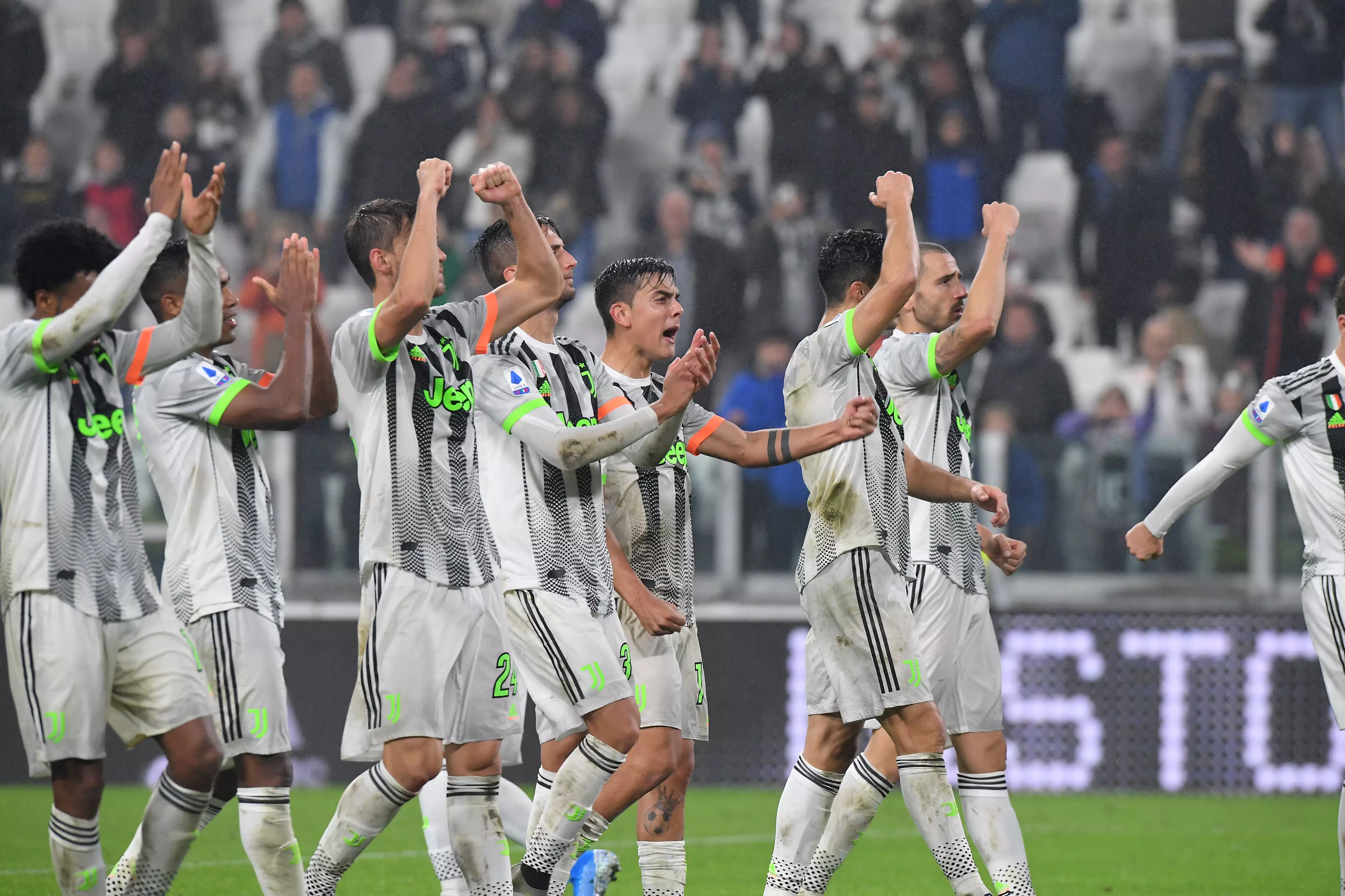 Juventus players celebrate at the final whistle. (Image