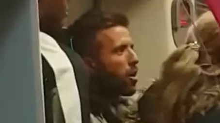 Man Headbutts Violent Passenger On Busy Commuter Train