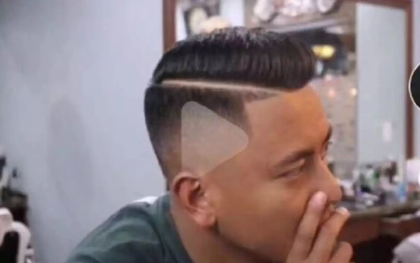 The barber thought the paused clip was what the customer wanted.