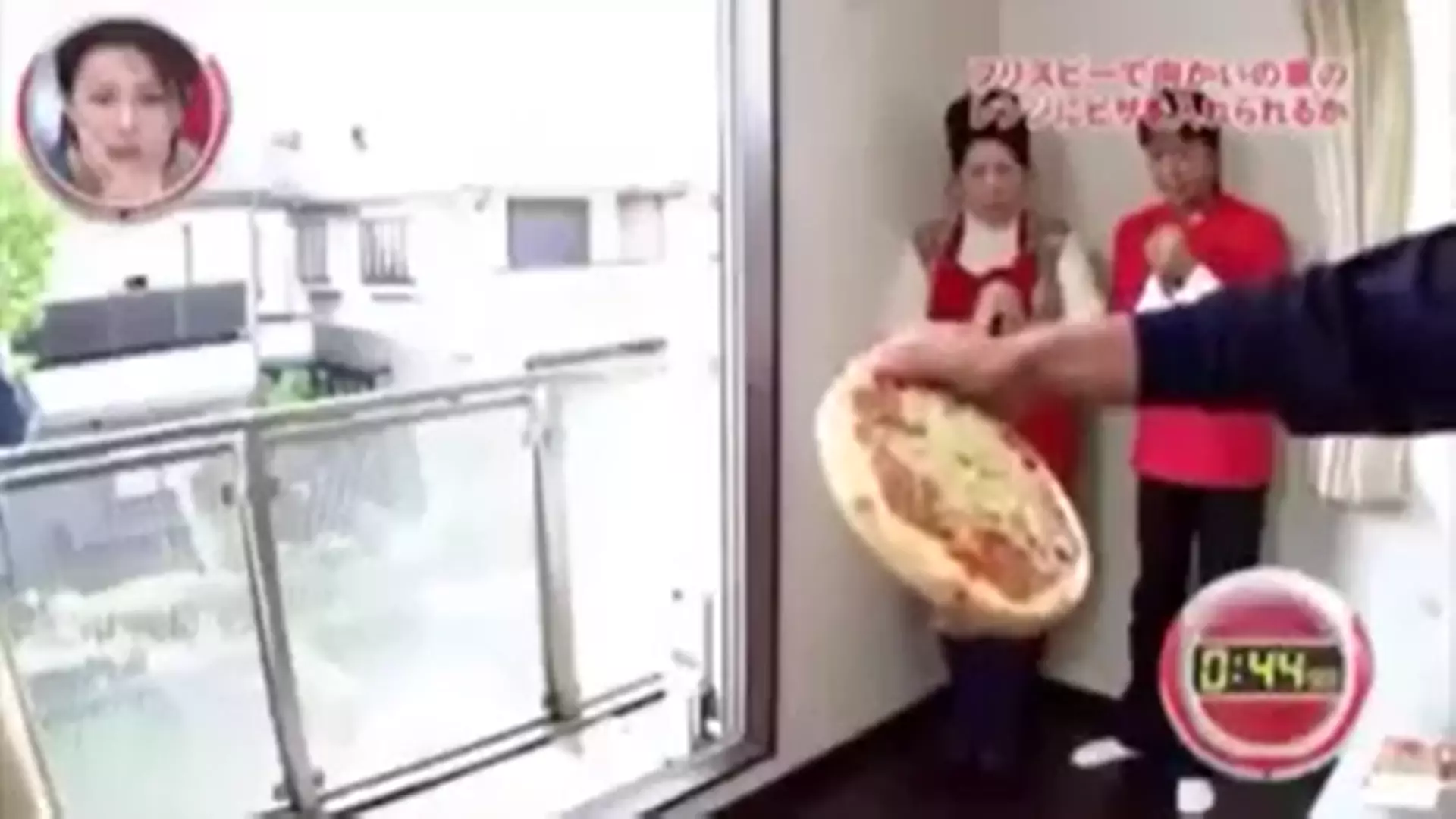 Video Shows Man Throwing Pizza Into Another Apartment's Microwave