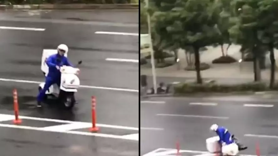 Domino's Driver Tries To Deliver Pizza Against The Force Of Japan's Typhoon Jebi 