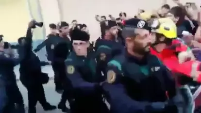 Firefighters Form Human Barrier To Protect Voters From Police In Catalonia Independence Referendum