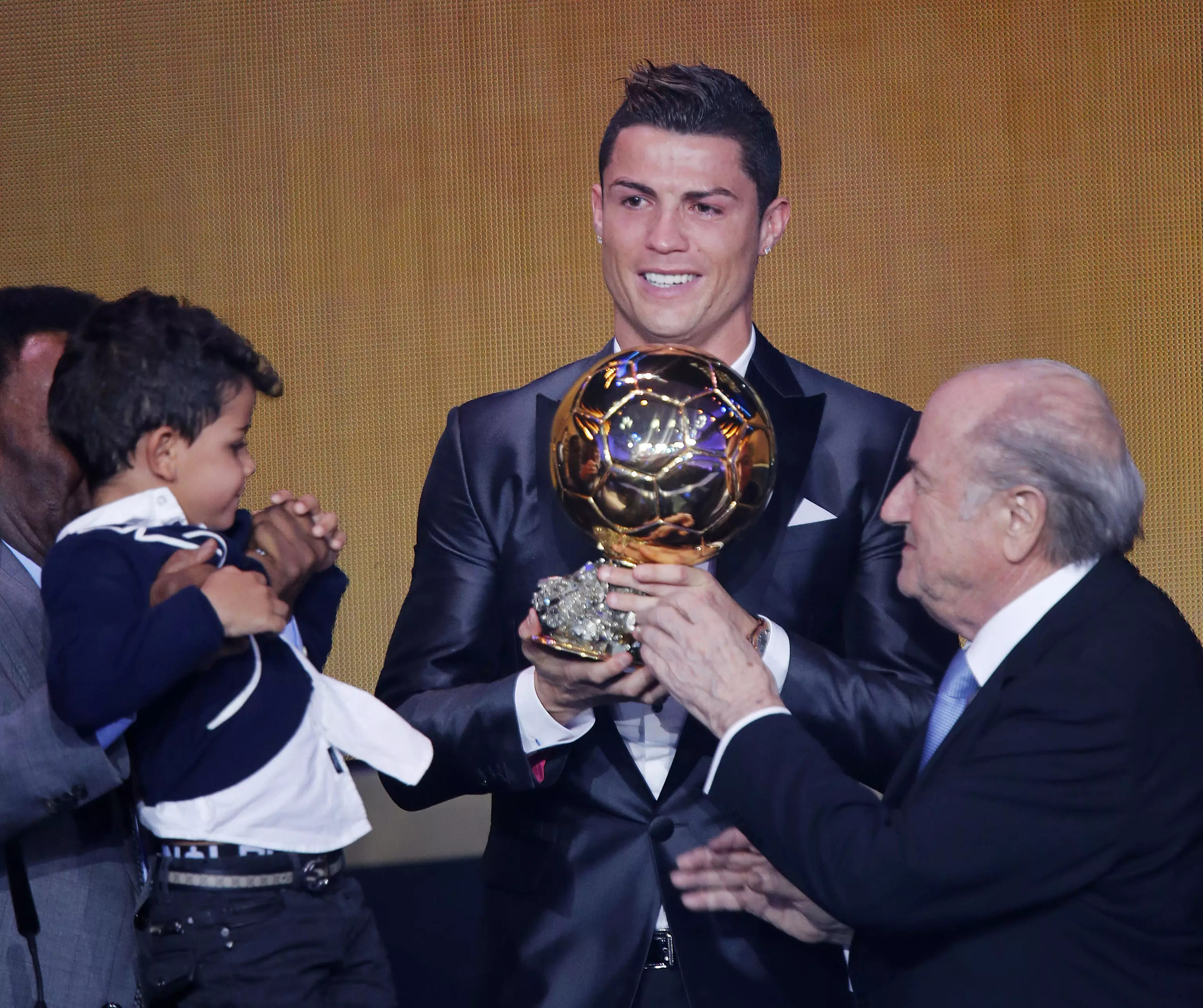 Ronaldo with one of his Ballon d'Ors. Image: PA Images