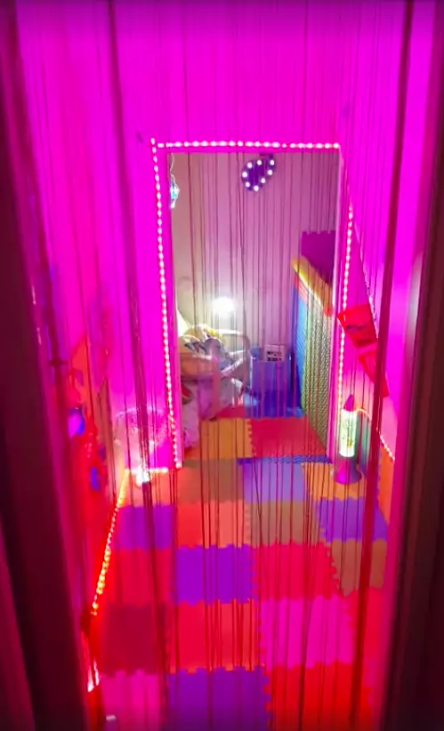 CJ's new sensory room, complete with LED lights, foam walls and a ball pit. (