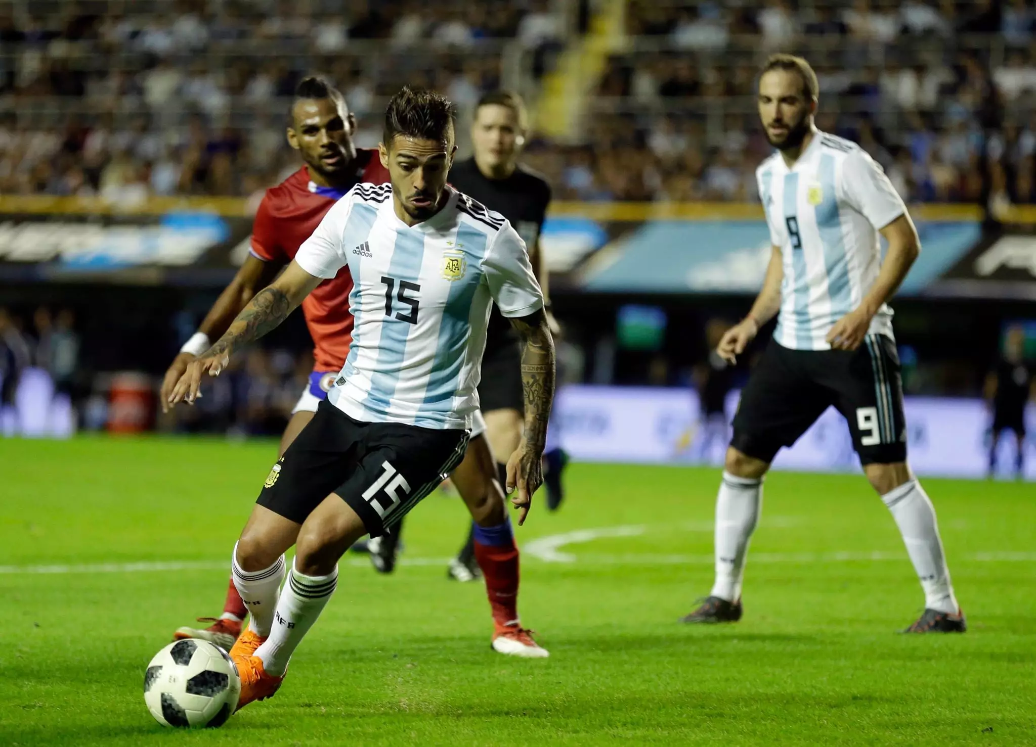 Lanzini in action for Argentina prior to his injury. Image: PA