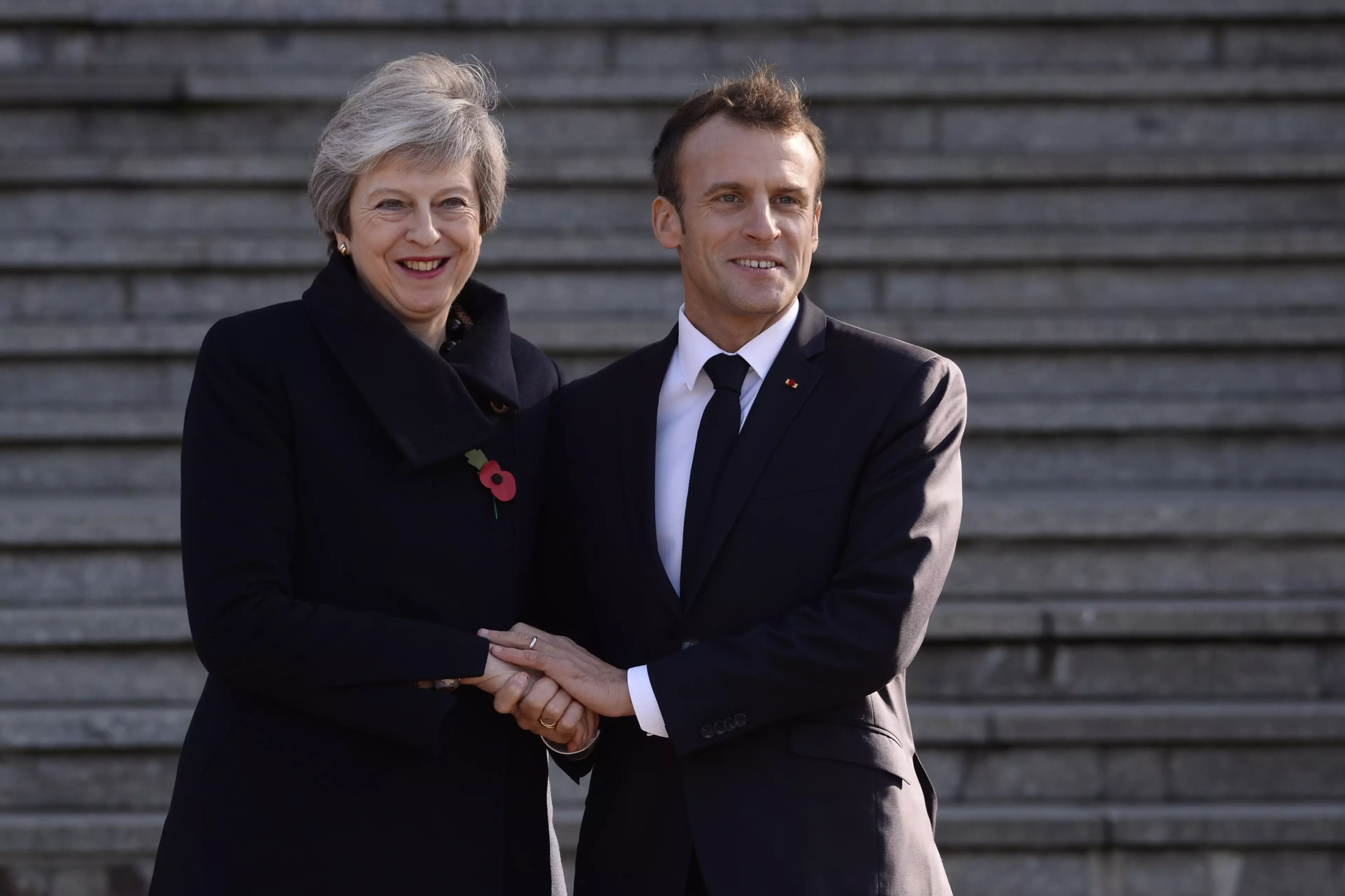 Theresa May meets with French President Emmanuel Macron.