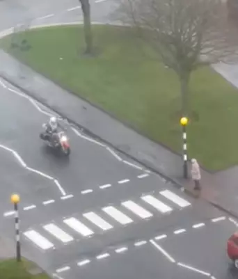 Biker Helps Old Lady Across The Road When Cars Don't Stop For Her.