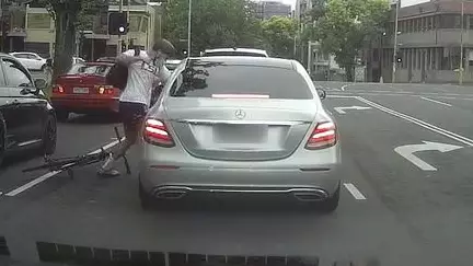 Australian Cyclist Hurls Punches At Passenger After Being Hit With Rubbish