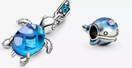 We're obsessed with this narwhal charm and glass turtle (
