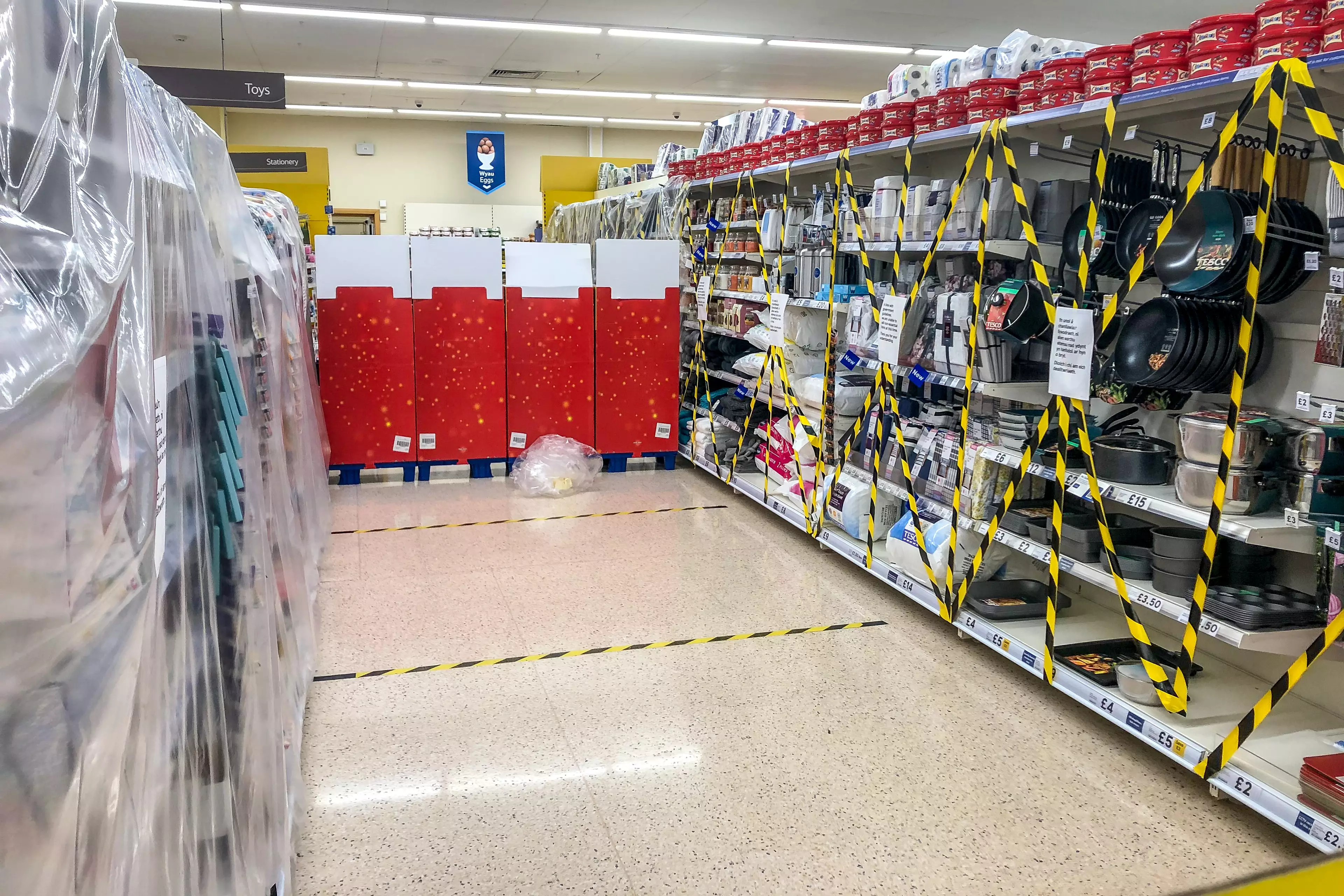 Non-essential items have been taped off in supermarkets.