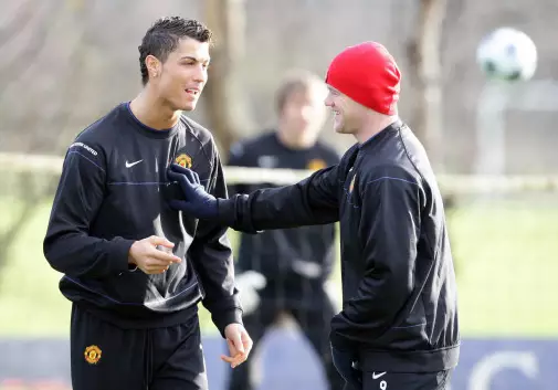 Ronaldo and Rooney during United training. Image: PA
