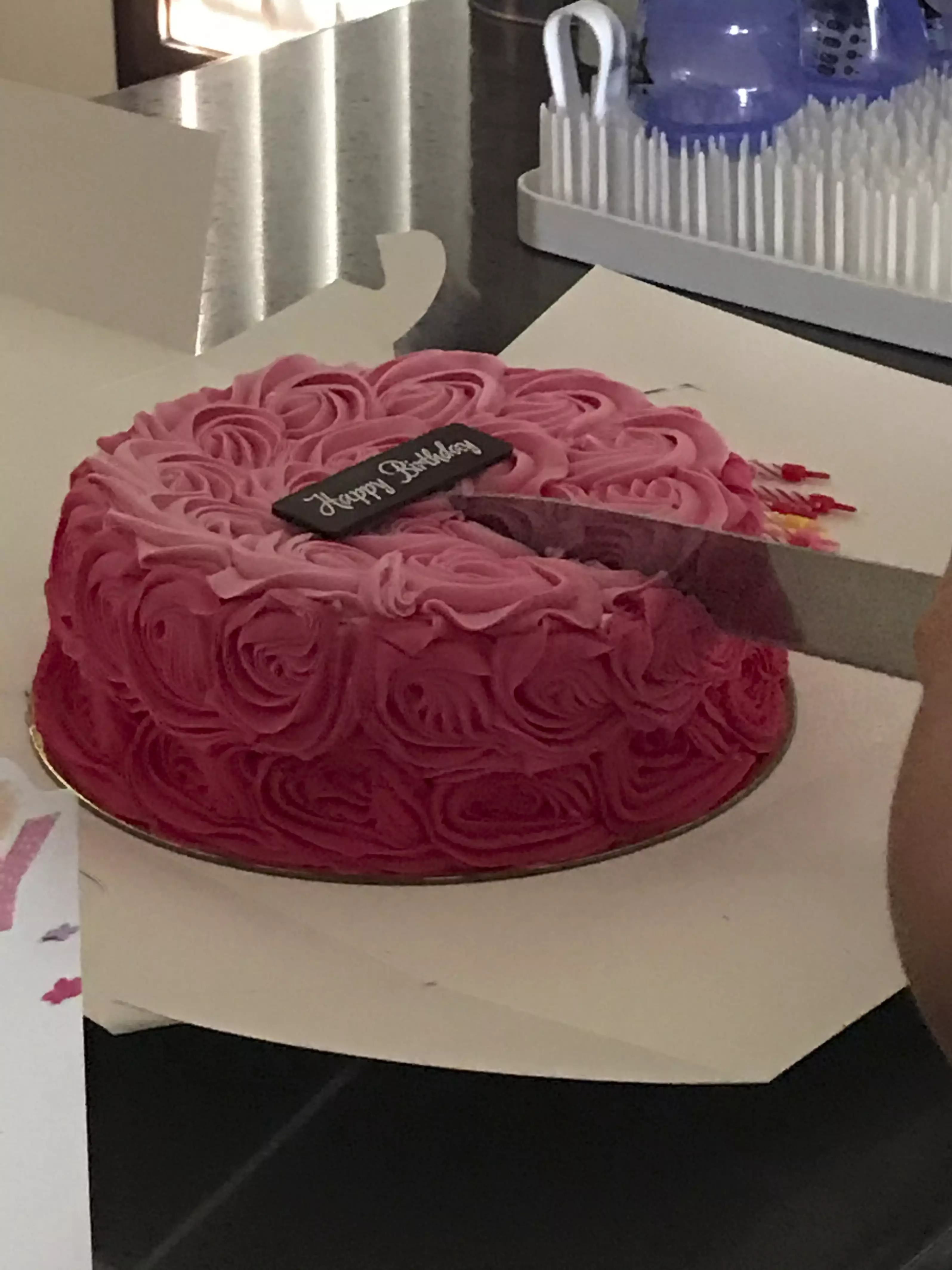 Cutting into the cake.