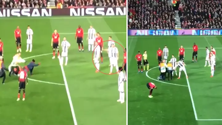 Old Trafford Pitch Invader Crawls Over To Cristiano Ronaldo After Being Taken Out By Stewards
